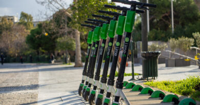 Row of electric scooters for rent