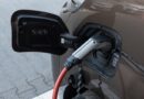 Electric delivery van on charging station.