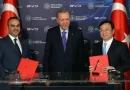 China's leading EV maker, BYD, signs a $1 billion deal to build a manufacturing plant in Turkey, capable of producing 150,000 vehicles annually and creating 5,000 jobs. This move allows BYD to avoid EU tariffs and continues its global expansion.