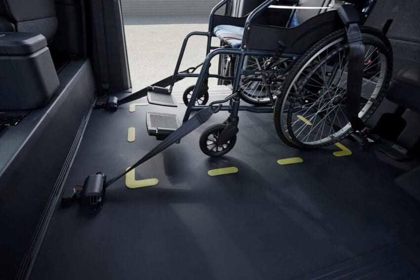 Kia PV5 side-entry WAV wheelchair mounting